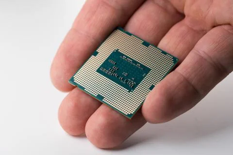 Computer processor in hand 写真素材