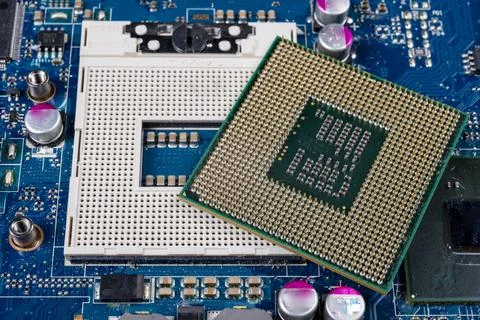 A computer processor located on the motherboard. Accessories and spare parts  Stock Photos