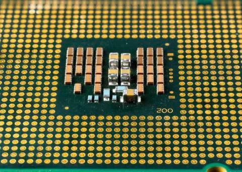 Computer processor, microcircuits on it, gold-plated contacts 写真素材