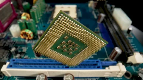 Computer processor on motherboard circuit background. CPU. Gold plated contacts Stock Footage 182403940