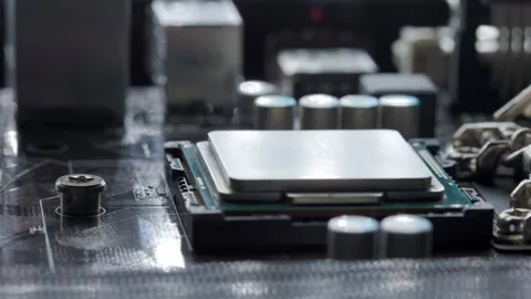 Computer processor in the motherboard slot. Stock-Footage 163684016