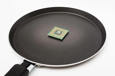 The computer processor in the pan. Hot processor Foto stock