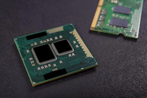 Computer processor, RAM and other accessories on the table. Spare parts for a 写真素材