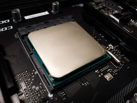 Computer processor in socket on motherboard of a gaming computer 스톡 사진