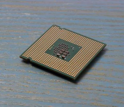 Computer processor on a wooden background 스톡 사진