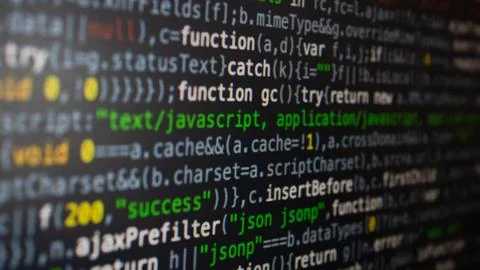 Computer program code on a black background. Close-up. High quality photo Foto stock