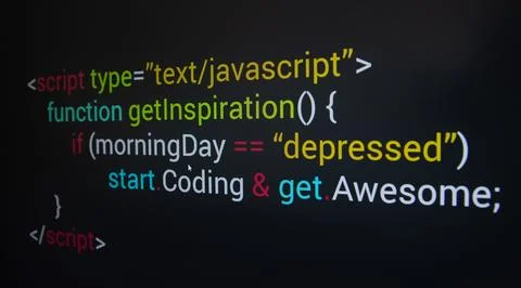 Computer program code on a black background. Close-up. High quality photo Foto stock