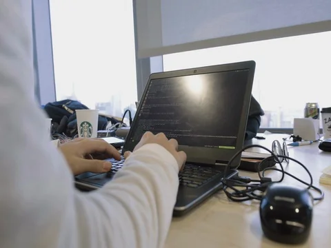 Computer programing on Laptop Stock Footage 80893643