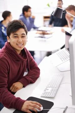 Computer, programmer and portrait of man with smile, software and update of Foto stock