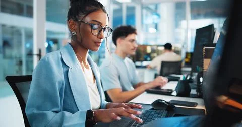 Computer, programmer and research with woman in office for game designer, coding Stock Photos