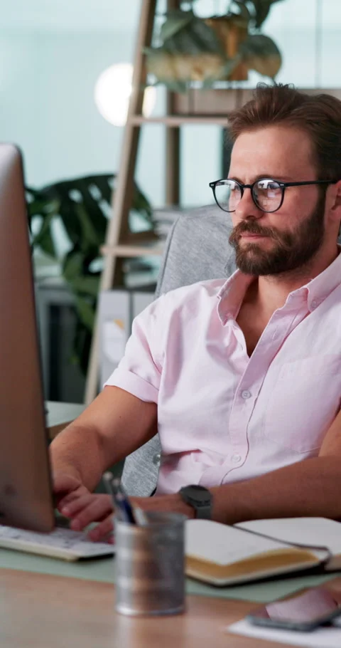 Computer, programmer and web development with man coding software in office for Stock Footage 307992620