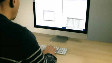 Computer programmer coding on computer Stock Footage 35090779