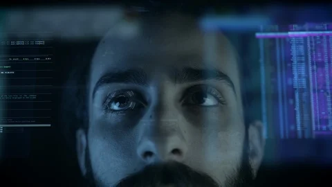 Computer programmer coding on futuristic holographic display Stock Footage 120923332