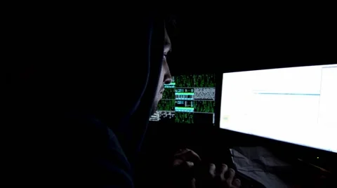 Computer programmer eating chips Stock Footage 62371964