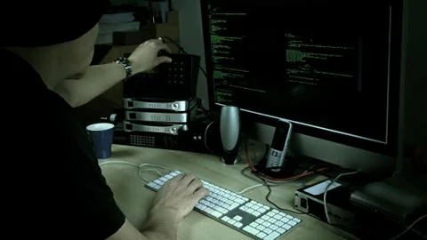 Computer programmer hacker at work Stock-Fotos