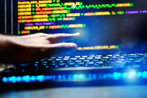 Computer of a programmer with lines code of software Stock Photos