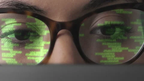 Computer programmer looking at data binary code  glasses reflection Stock Footage 168122559
