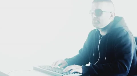 Computer programmer man typing on keyboard, hacker cyber crime, white background Stock Footage 57579552