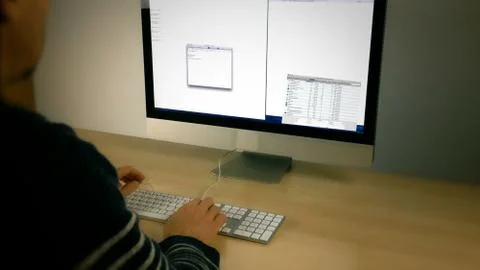 Computer programmer office worker using keyboard Foto stock