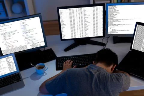 Computer programmer sleeping in the office Stock Photos