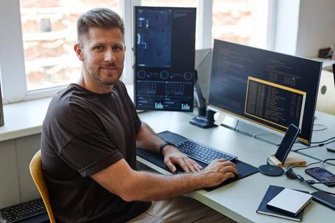 Computer Programmer Smiling at Camera 스톡 사진