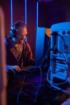 Computer programmer trying to solve the problem Stock Photos