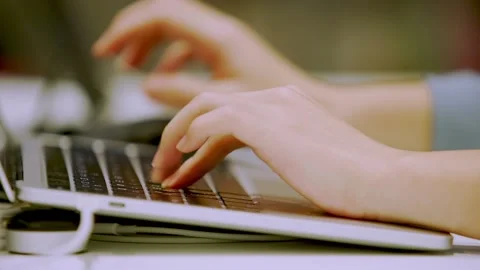 Computer programmer typing code on a flat keyboard Stock Footage 205250287