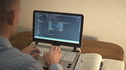 Computer programmer typing code on keyboard. Stock Footage 147565527
