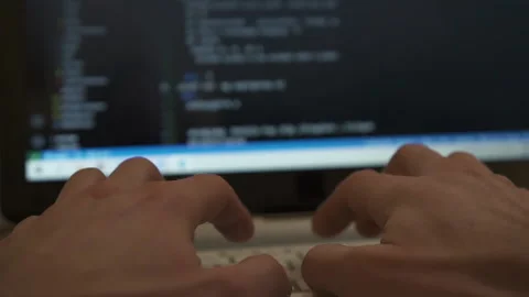 Computer programmer typing code on keyboard. Stock Footage 147565850