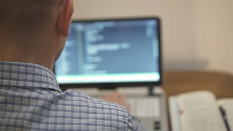 Computer programmer typing code on keyboard. Stock Footage 147565932