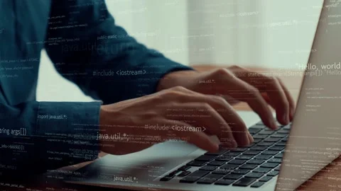 Computer programmer uses capable laptop computer to develop programming code Stock Footage 170607651