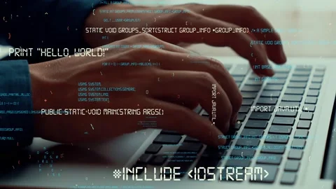 Computer programmer uses capable laptop computer to develop programming code Stock Footage 171045705