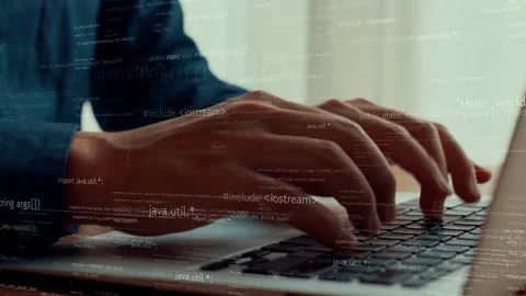 Computer programmer uses capable laptop computer to develop programming code Stock Footage 171045801