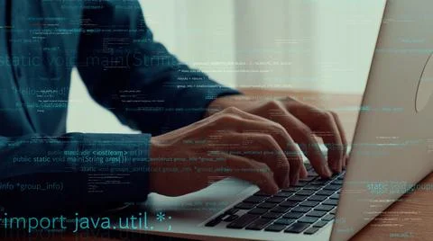 Computer programmer uses capable laptop computer to develop programming code Stock Photos