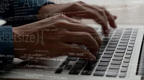 Computer programmer uses capable laptop computer to develop programming code Stock Photos