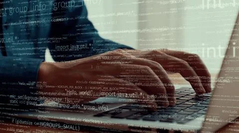 Computer programmer uses capable laptop computer to develop programming code Stock Photos