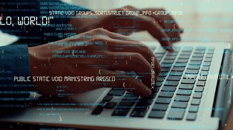 Computer programmer uses capable laptop computer to develop programming code Stock Photos