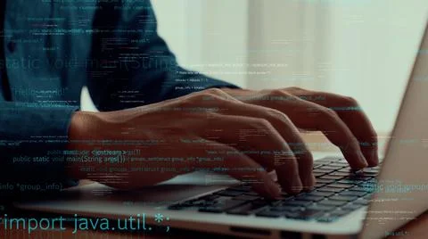 Computer programmer uses capable laptop computer to develop programming code Stock Photos