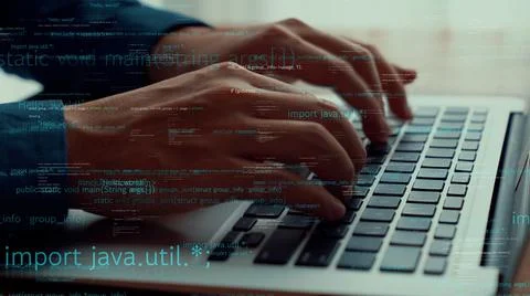 Computer programmer uses capable laptop computer to develop programming code Stock Photos