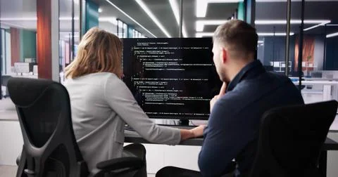 Computer Programmer Using Development Software 写真素材