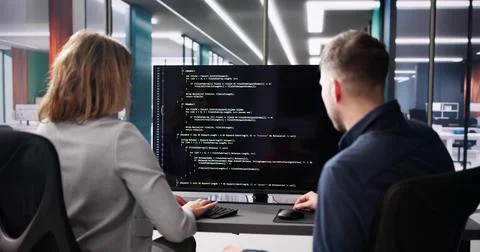 Computer Programmer Using Development Software Stock Photos