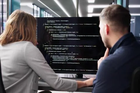 Computer Programmer Using Development Software Stockfoto's