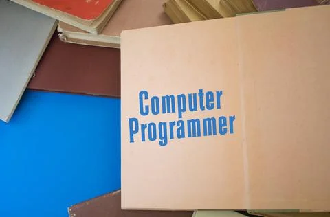 Computer Programmer word in opened book with vintage, natural patterns old .. 스톡 사진