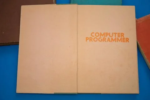 Computer Programmer word in opened book with vintage, natural patterns old .. 스톡 사진