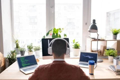 Computer programmer working on code Stock Photos
