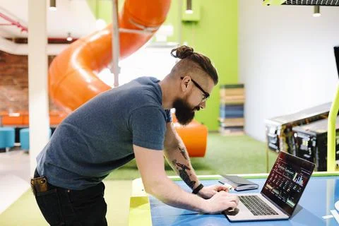 Computer programmer working in creative office 스톡 사진