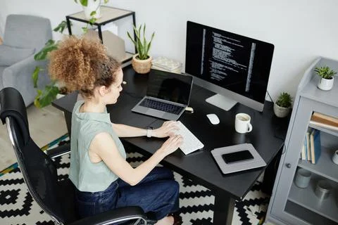 Computer programmer working at office Stock Photos