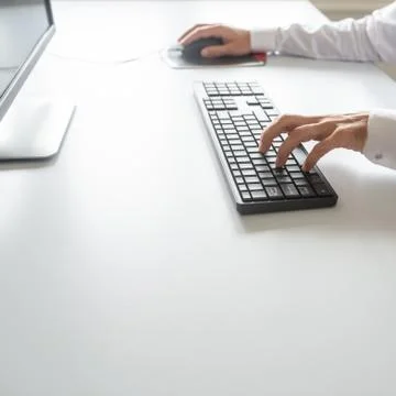 Computer programmer working using his office computer 스톡 사진