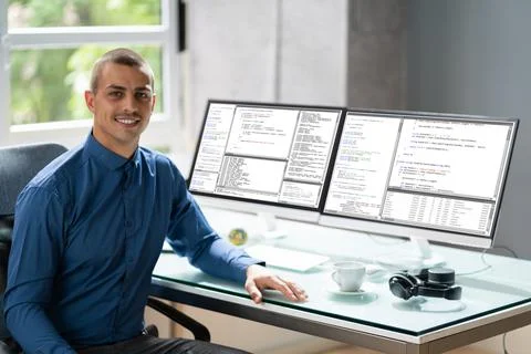 Computer Programmer Writing Program Code On Computer Stock Photos