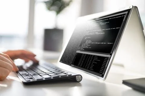 Computer Programmer Writing Program Code On Computer Stock Photos